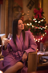 Image showing woman drinking champagne at spa