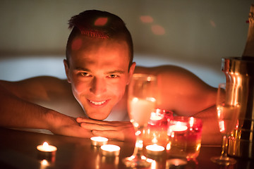 Image showing man relaxing in the jacuzzi