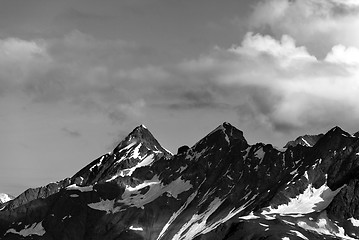 Image showing Black and white view on summer mountains with snow