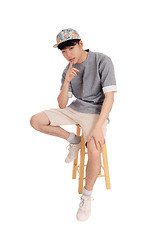 Image showing Asian man sitting and thinking.