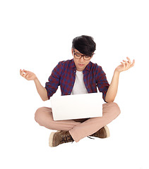 Image showing Young Asian teen with laptop.