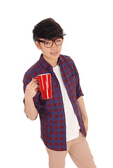 Image showing Asian man with coffee tee.		