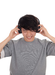 Image showing Asian man listen to music.