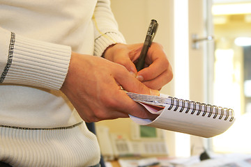 Image showing Journalist taking notes