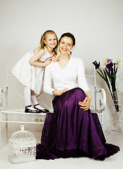 Image showing young mother with daughter at luxury home interior vintage