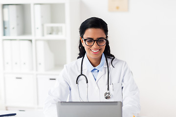 Image showing female doctor with laptop at hospital