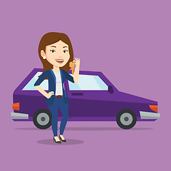 Image showing Woman holding keys to her new car.