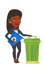 Image showing Woman with recycle bin and trash can.