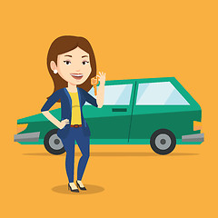 Image showing Woman holding keys to her new car.