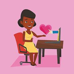 Image showing Young woman dating online using laptop.