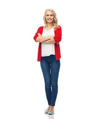 Image showing happy smiling young woman in red cardigan