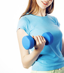 Image showing young pretty slim blond woman with dumbbell isolated cheerful smiling, measuring herself, diet people concept on white background