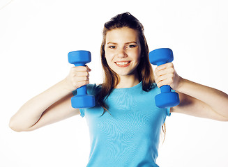 Image showing young pretty slim blond woman with dumbbell isolated cheerful smiling, measuring herself, diet people concept on white background