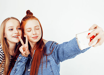 Image showing best friends teenage girls together having fun, posing emotional on white background, besties happy smiling, lifestyle people concept 