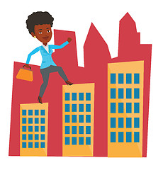 Image showing Businesswoman walking on roofs of the buildings.