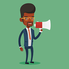 Image showing Business man speaking into megaphone.