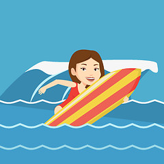 Image showing Happy surfer in action on a surf board.