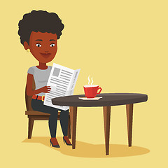 Image showing Woman reading newspaper and drinking coffee.