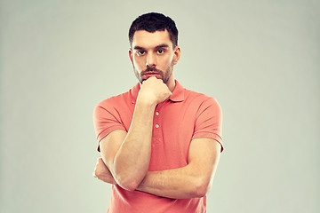 Image showing man thinking over gray background