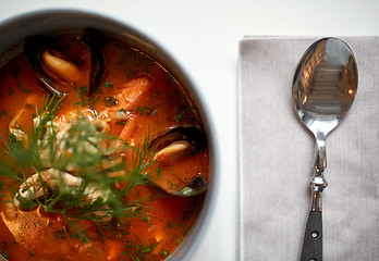 Image showing close up of seafood soup with fish and mussels
