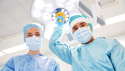 Image showing group of surgeons in operating room at hospital