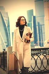 Image showing Beautiful brunette in a light coat