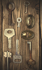 Image showing Set of vintage keys and keyholes