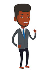 Image showing Smiling businessman pointing with his forefinger.