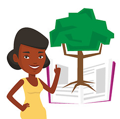 Image showing Student pointing at tree of knowledge.