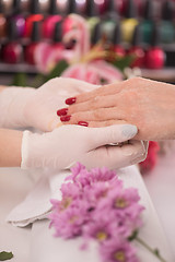 Image showing Woman hands receiving a manicure