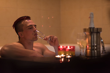 Image showing man relaxing in the jacuzzi