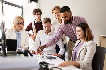 Image showing business team discussing house project at office