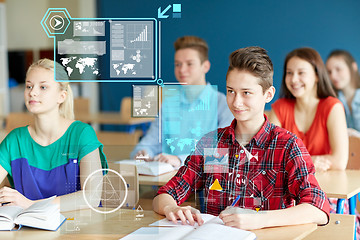 Image showing group of students with notebooks at school lesson