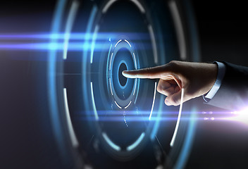 Image showing male hand pointing finger to virtual projection