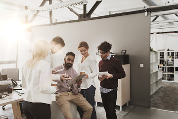 Image showing business team with tablet pc and coffee at office