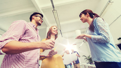 Image showing creative team on coffee break talking at office