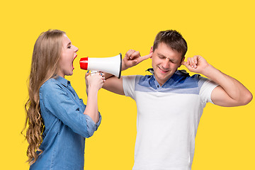 Image showing Woman shouting in megaphones at each other