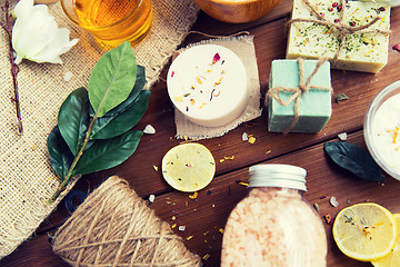 Image showing close up of body care cosmetic products on wood