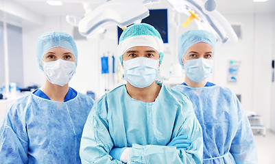 Image showing group of surgeons in operating room at hospital