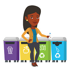 Image showing Woman throwing away plastic bottle.