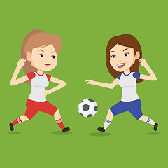 Image showing Two female soccer players fighting for ball.