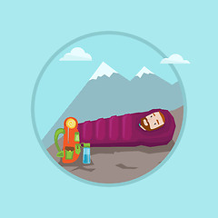 Image showing Man lying in sleeping bag in the mountains.