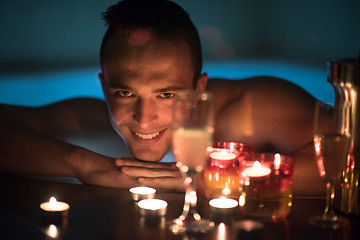 Image showing man relaxing in the jacuzzi