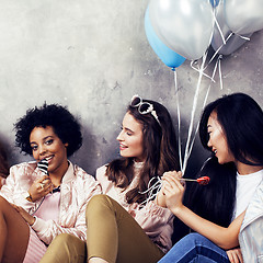 Image showing Lifestyle and people concept: young pretty diversity nations woman with different age children celebrating on birth day party together happy smiling, making selfie. African-american, asian and caucasi