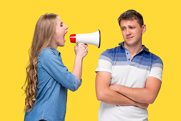 Image showing Woman shouting in megaphones at each other