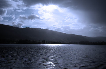 Image showing Lake amongst the woods, cloudy summer sky, Sweden