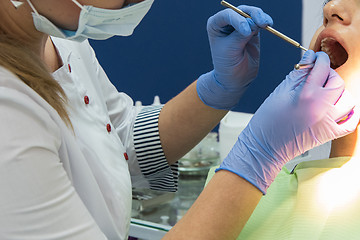 Image showing Dentist working in dentist office