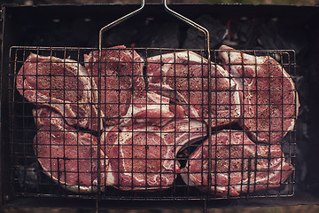 Image showing Grilling fresh entrecote pork