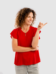 Image showing Happy woman pointing