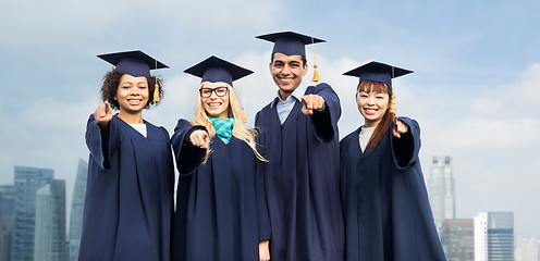 Image showing students or bachelors pointing at you over city